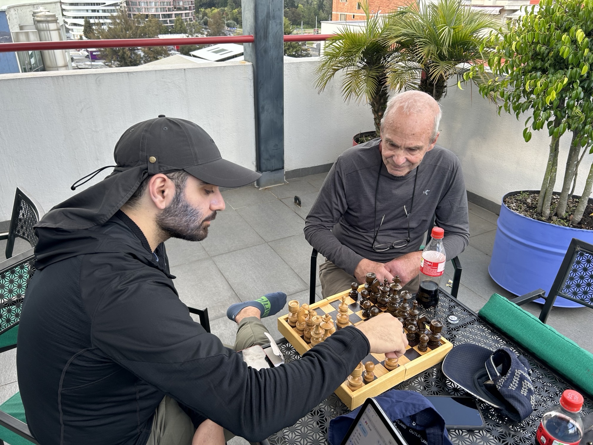 Farid playing chess at the hotel